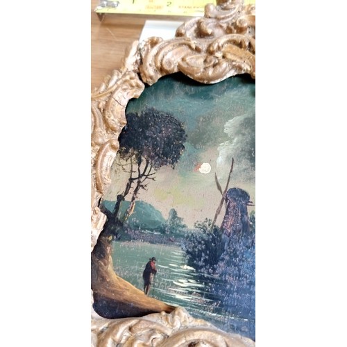 105 - Pair of possible early 20th Century Night time Dutch scenes in ornate matching picture frames