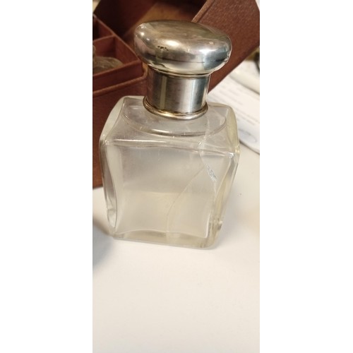 128 - 19th Century silver topped cologne decanters in leather case A/F see photos for damage