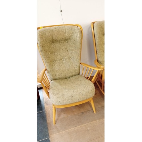 7 - 3 x Ercol Windsor arm chairs plus foot stool