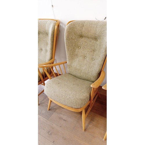 7 - 3 x Ercol Windsor arm chairs plus foot stool