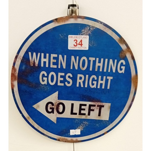 34 - 'When nothing goes right go left' sign