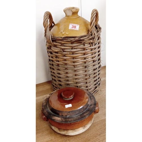 38 - Flagon in wicker basket & 1 other