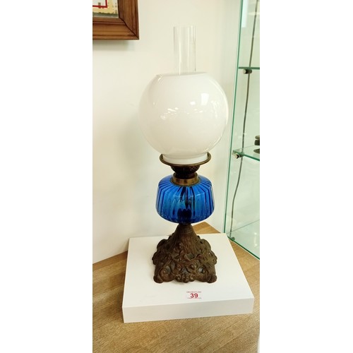 39 - Vintage oil lamp with metal base and blue glass