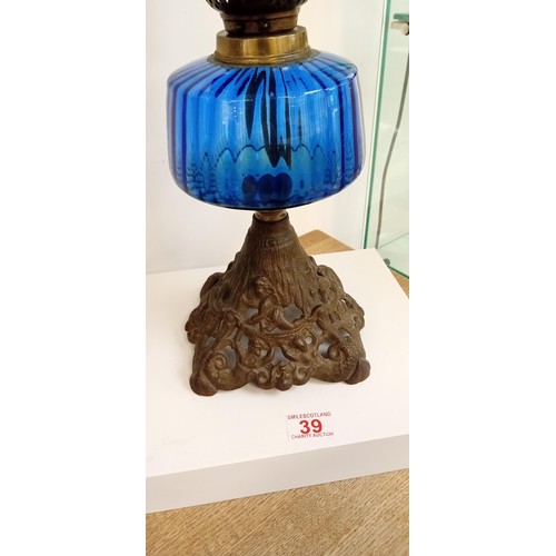 39 - Vintage oil lamp with metal base and blue glass