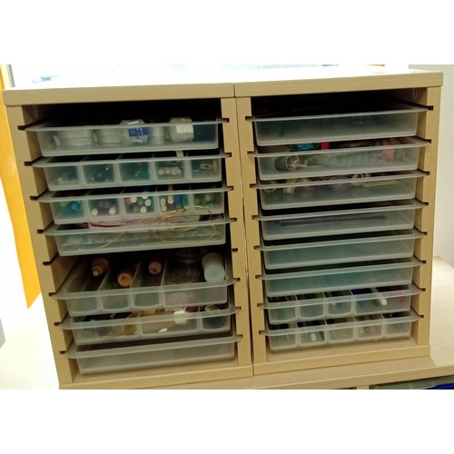 58 - 2x small drawer cabinets full of craft materials