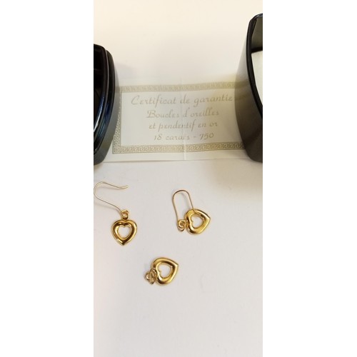 184 - 18ct gold pair of earrings & matching pendant