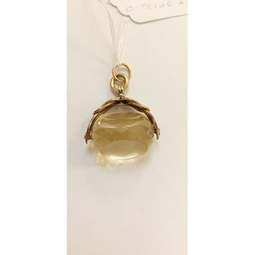 208 - 9ct gold albert fob with large citrine stone