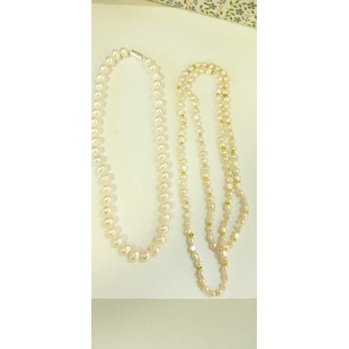 220 - 2 Cultured pearl necklaces