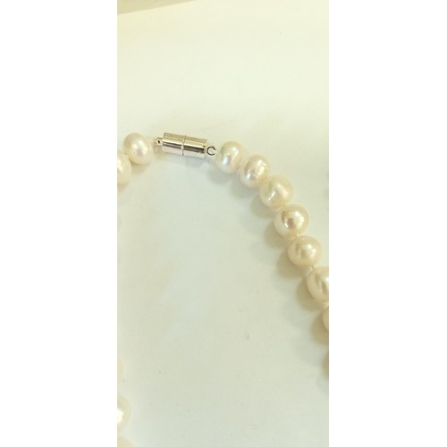 220 - 2 Cultured pearl necklaces