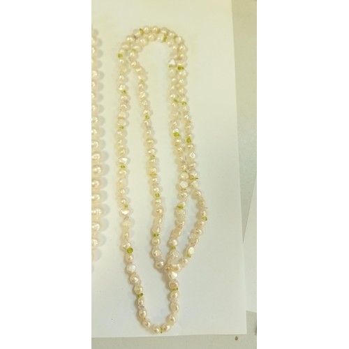 220 - 2 Cultured pearl necklaces