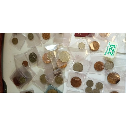 229 - Large selection of collectable coins mainly in coin sleeves