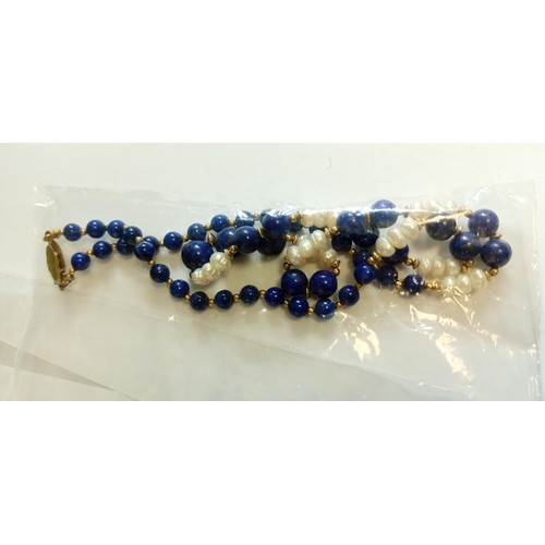 239 - 2 cultured pearl necklaces with garnet & Lapis Lazuli