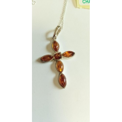 241 - Amber and silver cross necklace