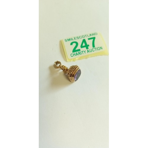 247 - Fully hallmarked 9ct gold and purple stone fob seal charm