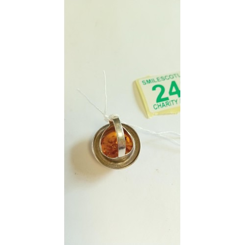 249 - Unmarked sterling silver and amber ring, size Q approx.