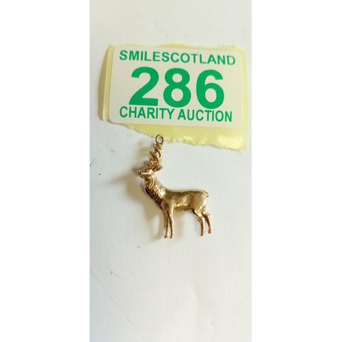 286 - Fully hallmarked 9ct deer charm weighs 4g approx.