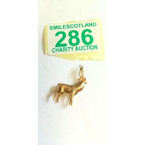 286 - Fully hallmarked 9ct deer charm weighs 4g approx.