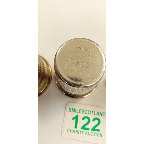 122 - Just a thimbleful 2, 1 1/2, 1 oz spirit measures