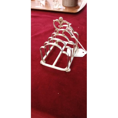 128 - Dainty EPNS toast rack