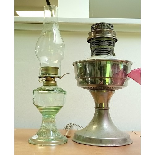 147 - Selection of paraffin lamps plus one other