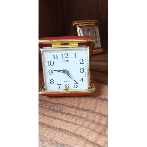 176 - Selection of vintage travelling clocks, barometer & Smiths clock