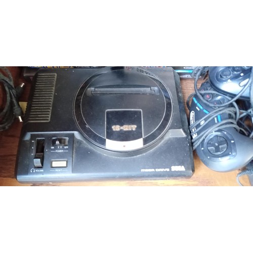 177 - Sega Mega drive with a large selection of games