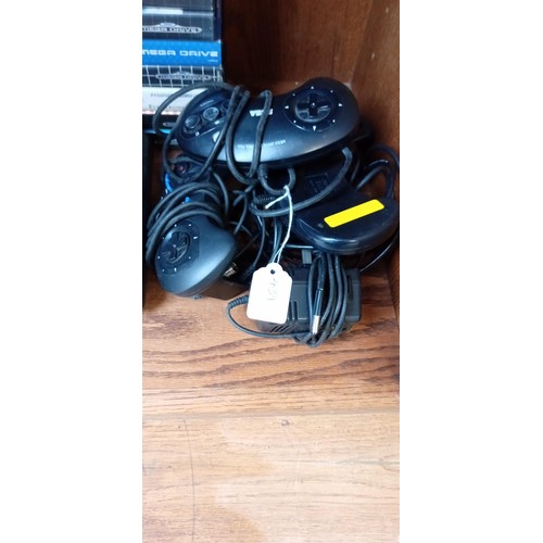 177 - Sega Mega drive with a large selection of games