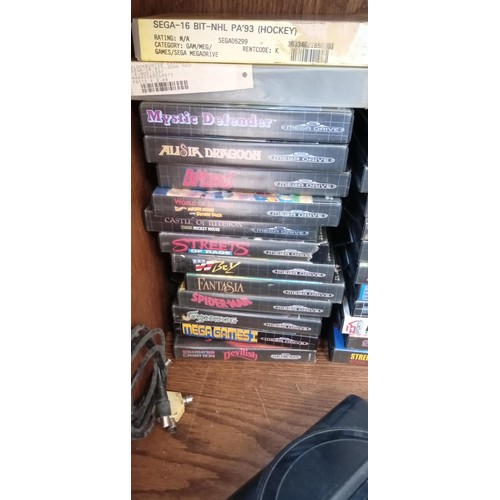 177 - Sega Mega drive with a large selection of games