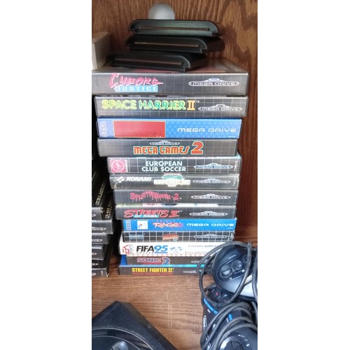 177 - Sega Mega drive with a large selection of games