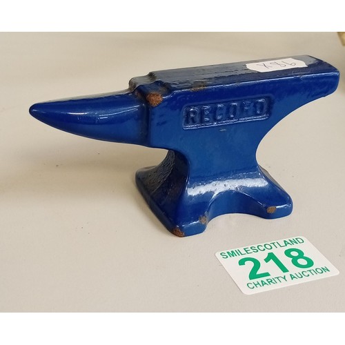 218 - Miniature record anvil