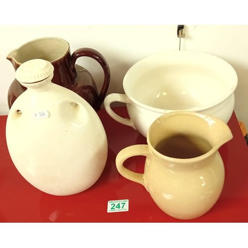 247 - Glazed vintage jugs plus the Mecca hot water bottle