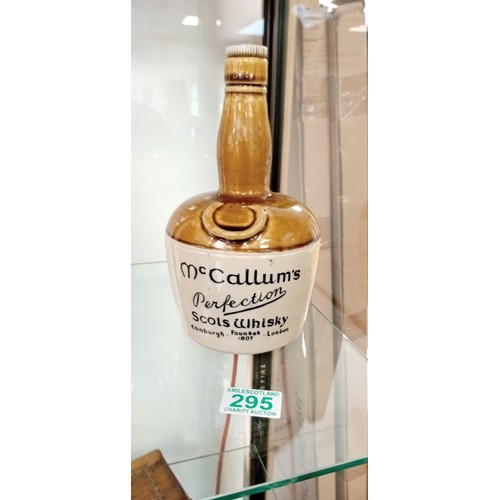 295 - McCallum's perfection Scots whisky flagon