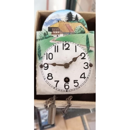 298 - Vintage miniature wall clock with enamel face