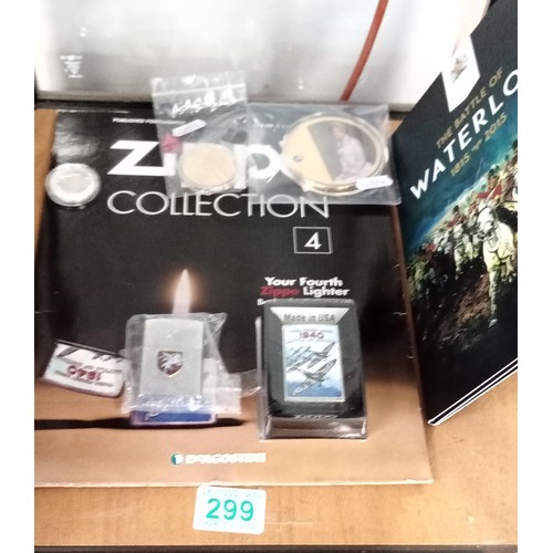 299 - 2 Zippo lighters plus a selection of coins