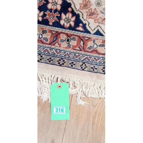 316 - Large floor rug measures 380cm x 275cm approx.