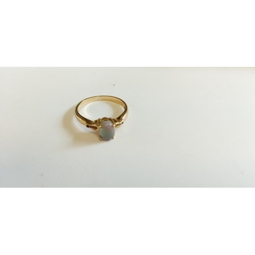 70 - 9ct gold and opal ring size K approx weighs 1.7g approx.