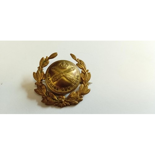 74 - Machine Gun Corps hat badge by J.R.Gaunt