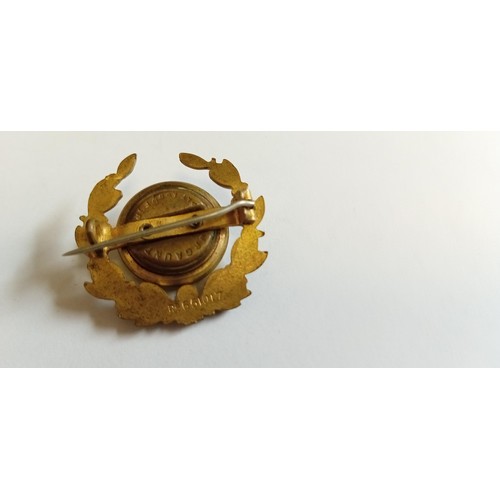 74 - Machine Gun Corps hat badge by J.R.Gaunt