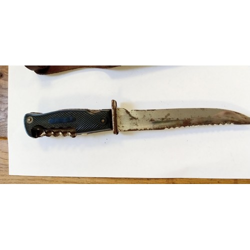 7 - Vintage Solingen fishing knife with pen knife handle containing smaller blades, saw, corkscrew etc, ... 