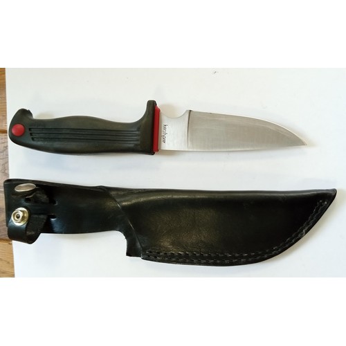 10 - Vintage Kershaw medium knife 1013 Japan with black plastic grip with red embellishments and a black ... 