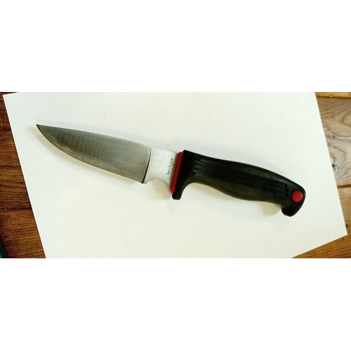 10 - Vintage Kershaw medium knife 1013 Japan with black plastic grip with red embellishments and a black ... 