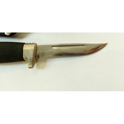 11 - Vintage Marttiini Finland small knife with signature on the blade and rubber handle with black leath... 