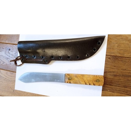 28 - Vintage Hudson Bay Knife & Toolworks large knife with carved wooden handle and brown leather sheath