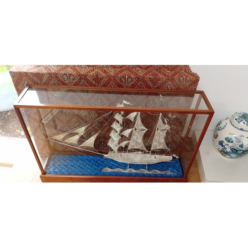 13 - Filigree silver ship in glass case