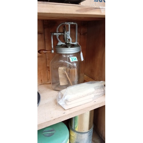 234 - Vintage butter churn with patters