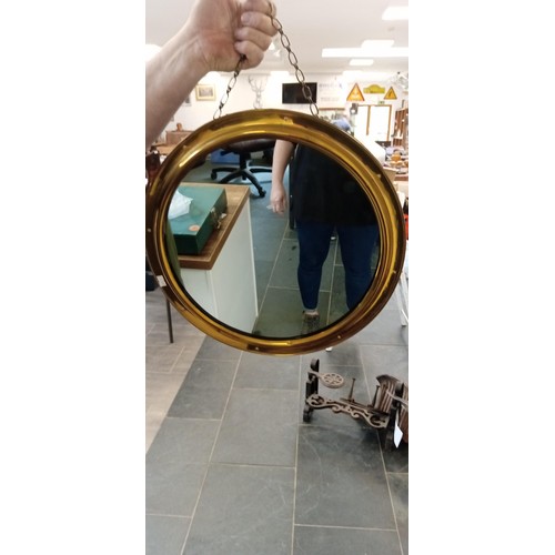 75A - Round brass framed mirror