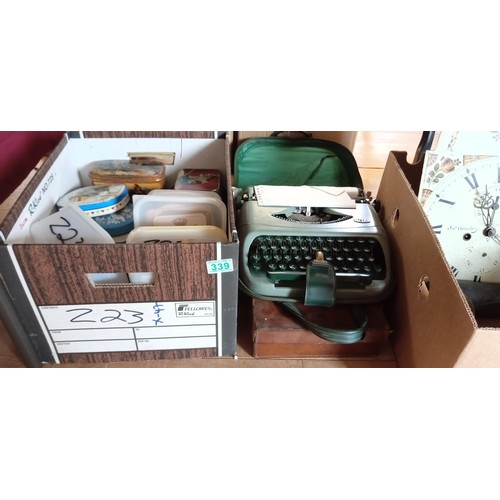 339 - Royal typewriter, collectible tins & bar mats