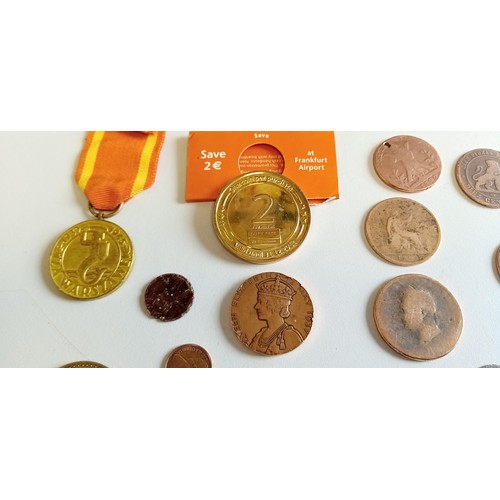 23 - Selection of medals and coins to include euros etc