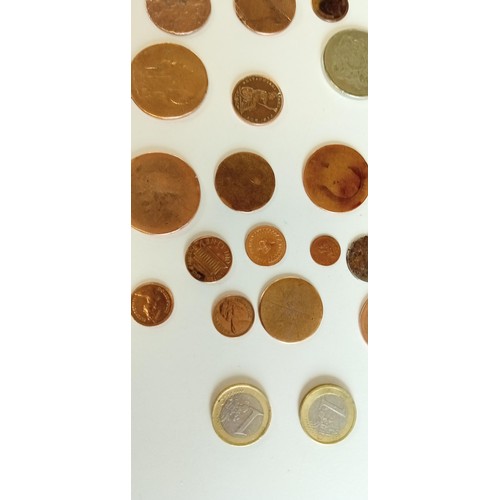 23 - Selection of medals and coins to include euros etc