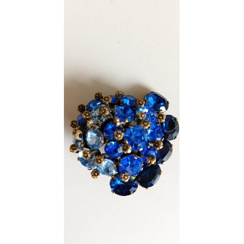 62 - Vintage brooch with lovely blue stones